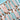 Chocolate covered pretzels with pink and blue sprinkles