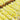 Chocolate covered pretzel rods with yellow and white sprinkles